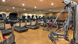 A gym with treadmills, elliptical machines, and weightlifting equipment. - Sheraton 3BR, 3BA: New Years Week- Top Fl. Direct on Mountain & 100% Ski-In/Out! (Steamboat Springs)
