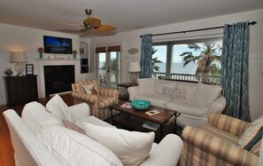TV, fireplace, books
