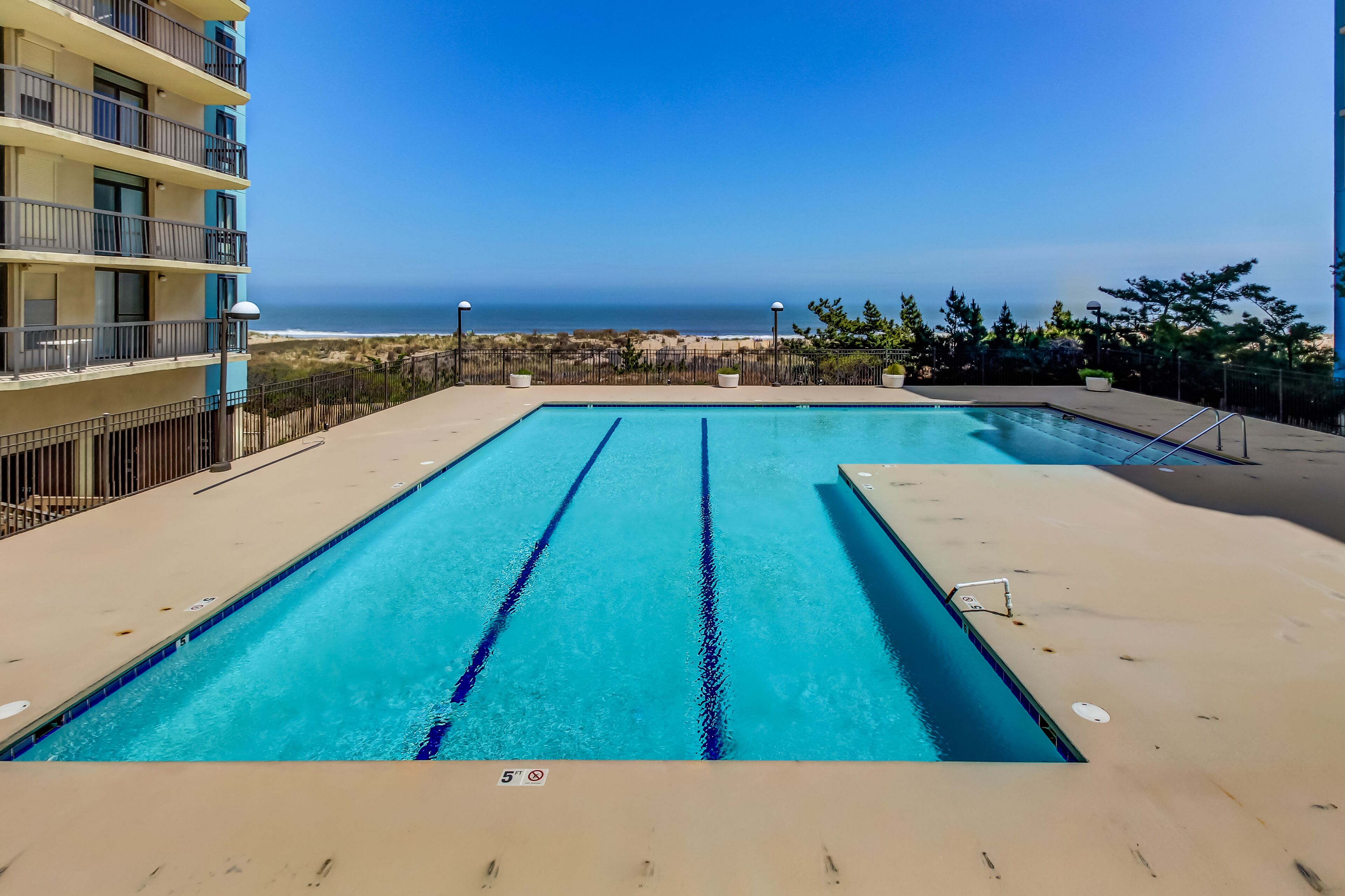 Ocean view condo w/ balcony & shared pool, tennis & game room - steps to beach