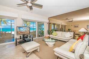 Condo, 3 Bedrooms, Beachfront | Living area | TV, DVD player - The Colonial Club, Oceanfront Condos (Seven Mile Beach)