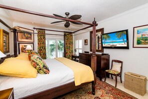 Condo 3 bedroom, Partial Ocean View | 3 bedrooms, in-room safe, individually decorated, individually furnished - The Colonial Club, Oceanfront Condos (Seven Mile Beach)