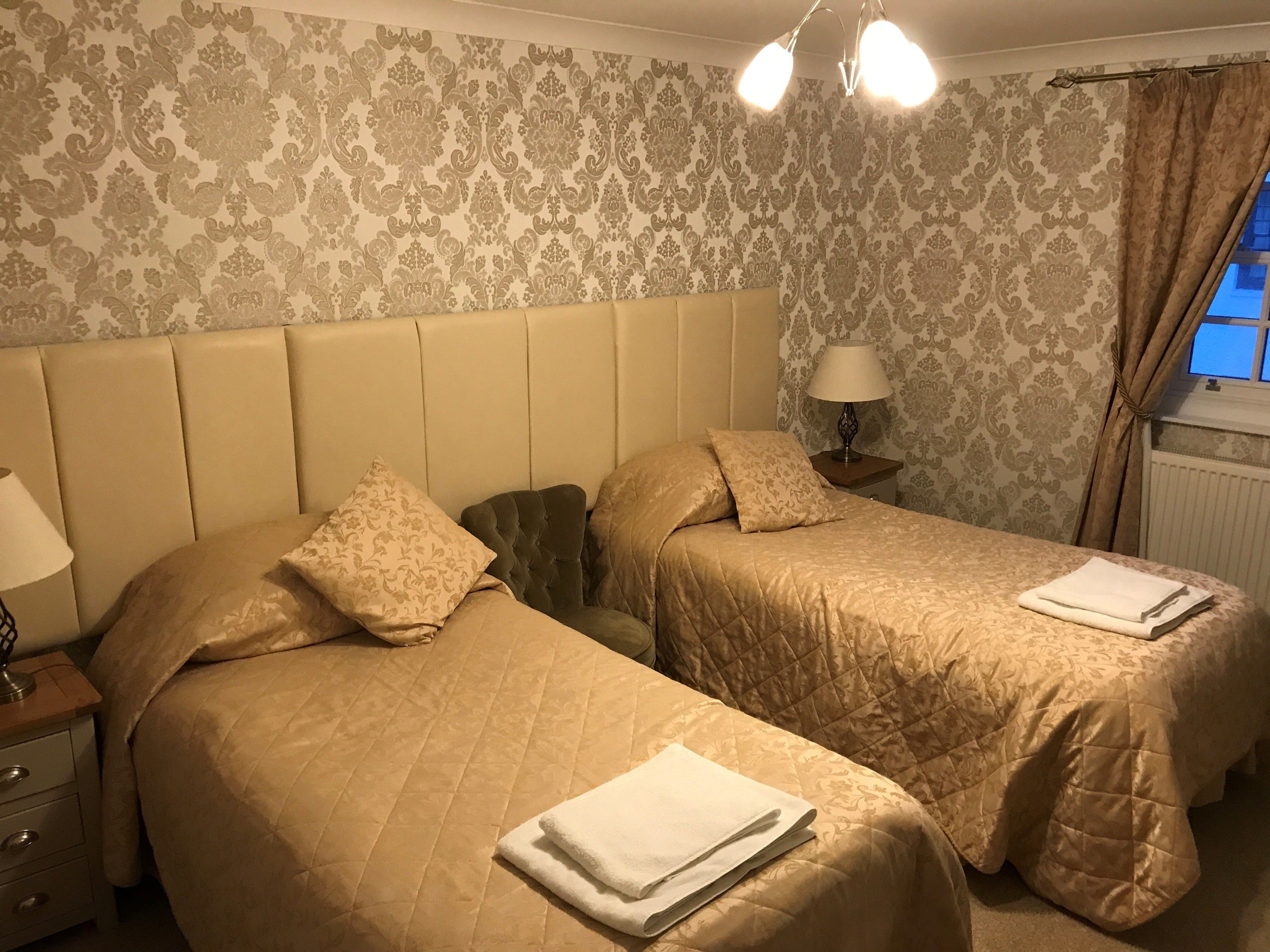 twin room | in-room safe, individually decorated, individually furnished, desk