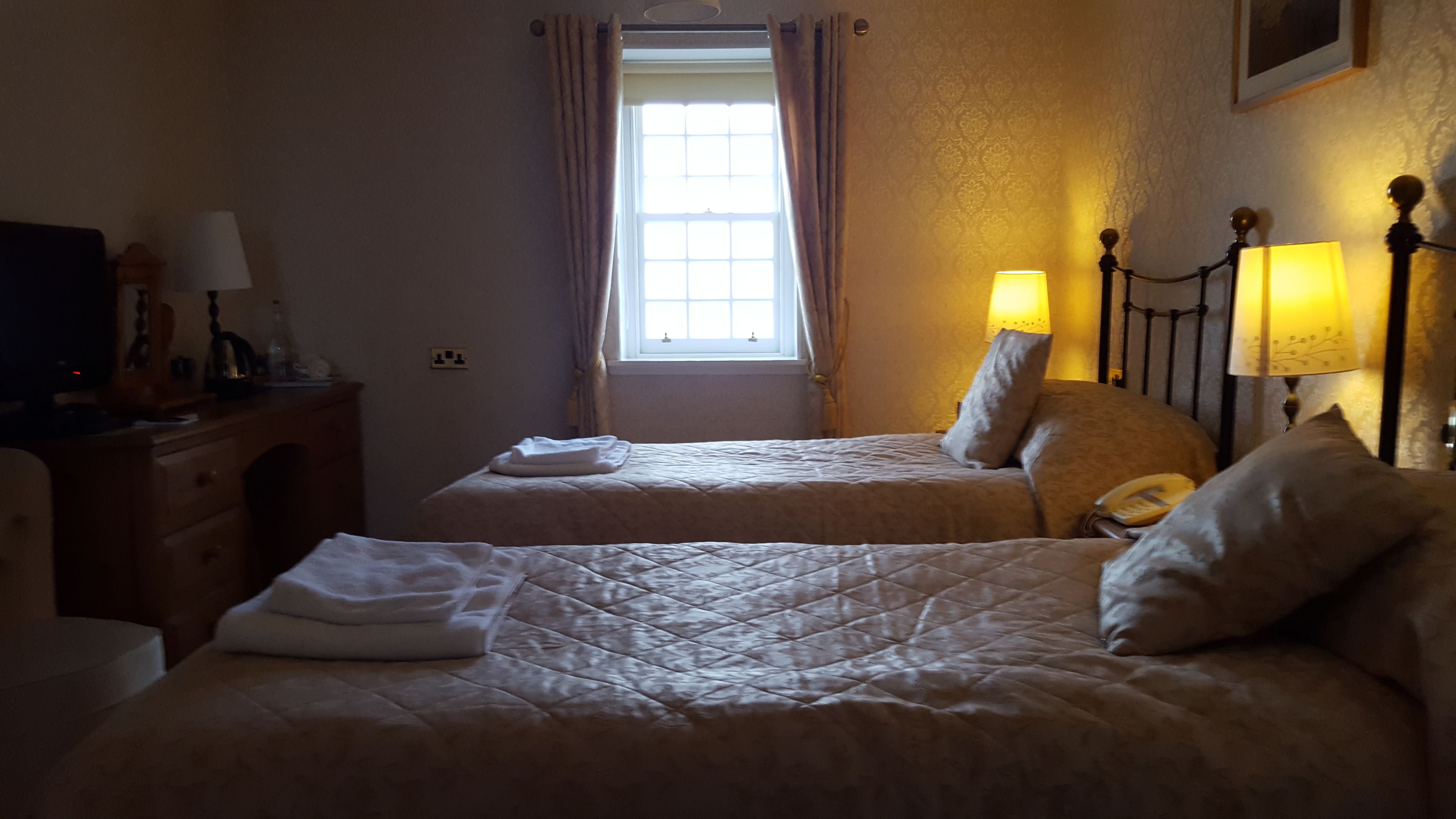 twin room | in-room safe, individually decorated, individually furnished, desk