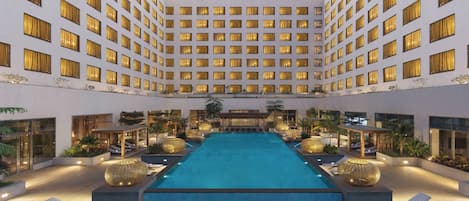 Outdoor pool, free cabanas, pool umbrellas