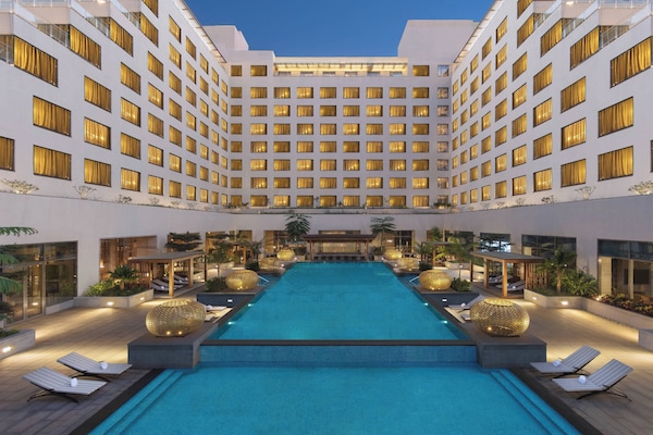 Outdoor pool, open 7:00 AM to 10:00 PM, free cabanas, pool umbrellas