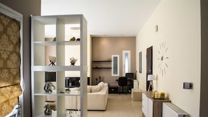 Luxury Villa, 2 Bedrooms, Hot Tub, Garden Area | Living area | Flat-screen TV, fireplace, DVD player, toys - Chris Rea Villa (Skiathos)