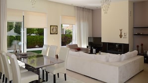 Luxury Villa, 2 Bedrooms, Hot Tub, Garden Area | Living room | Flat-screen TV, fireplace, DVD player, toys - Chris Rea Villa (Skiathos)