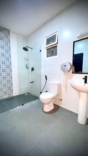 Superior Single Room | Bathroom | Slippers - Armaan Suites and Restaurant (Mombasa)