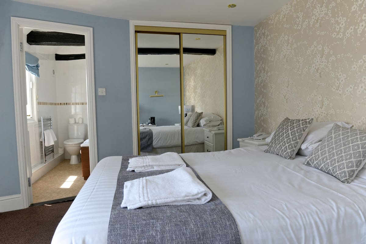 Double Room | Iron/ironing board (on request), bed sheets