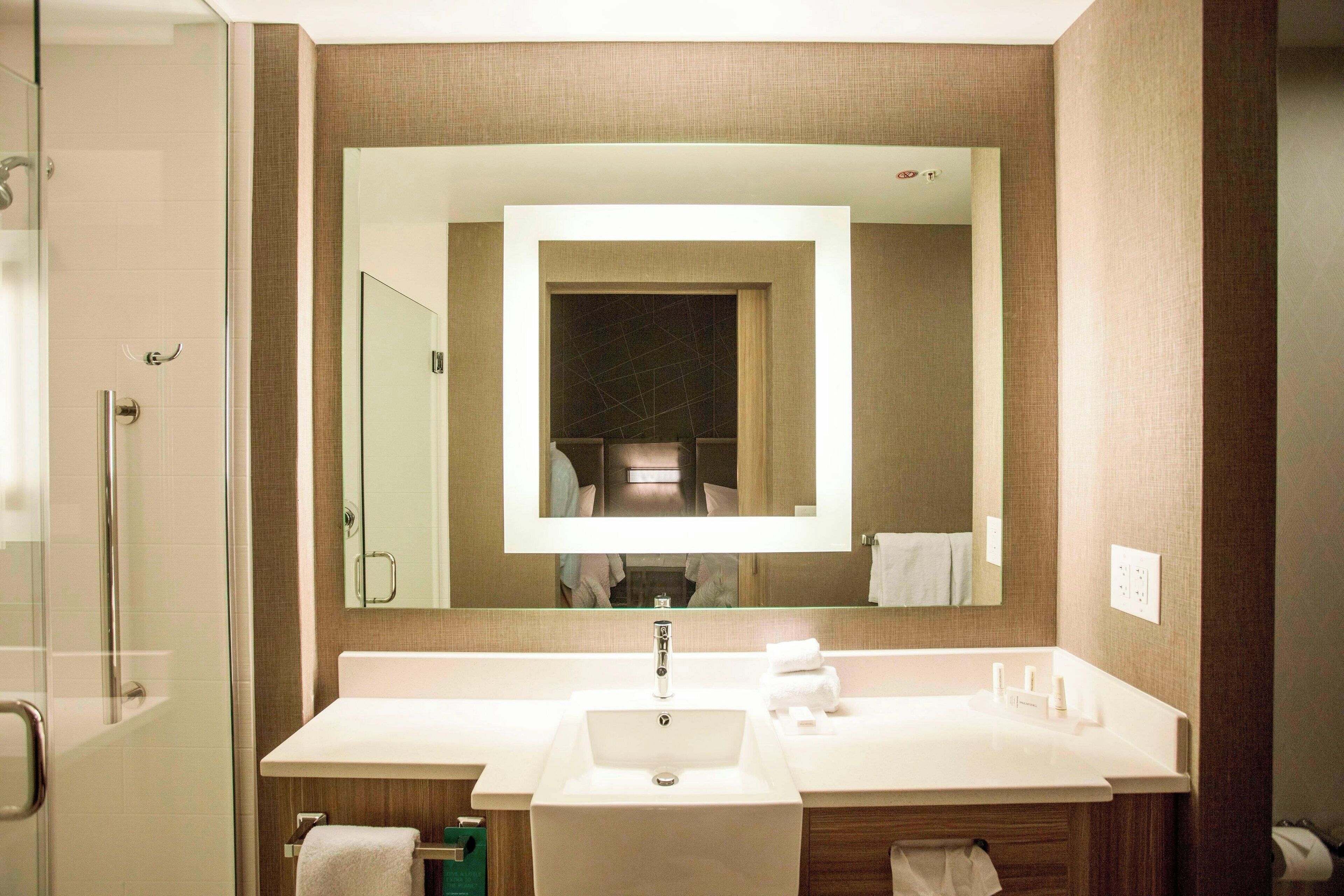 suite, 2 queen beds | bathroom | free toiletries, hair dryer, towels