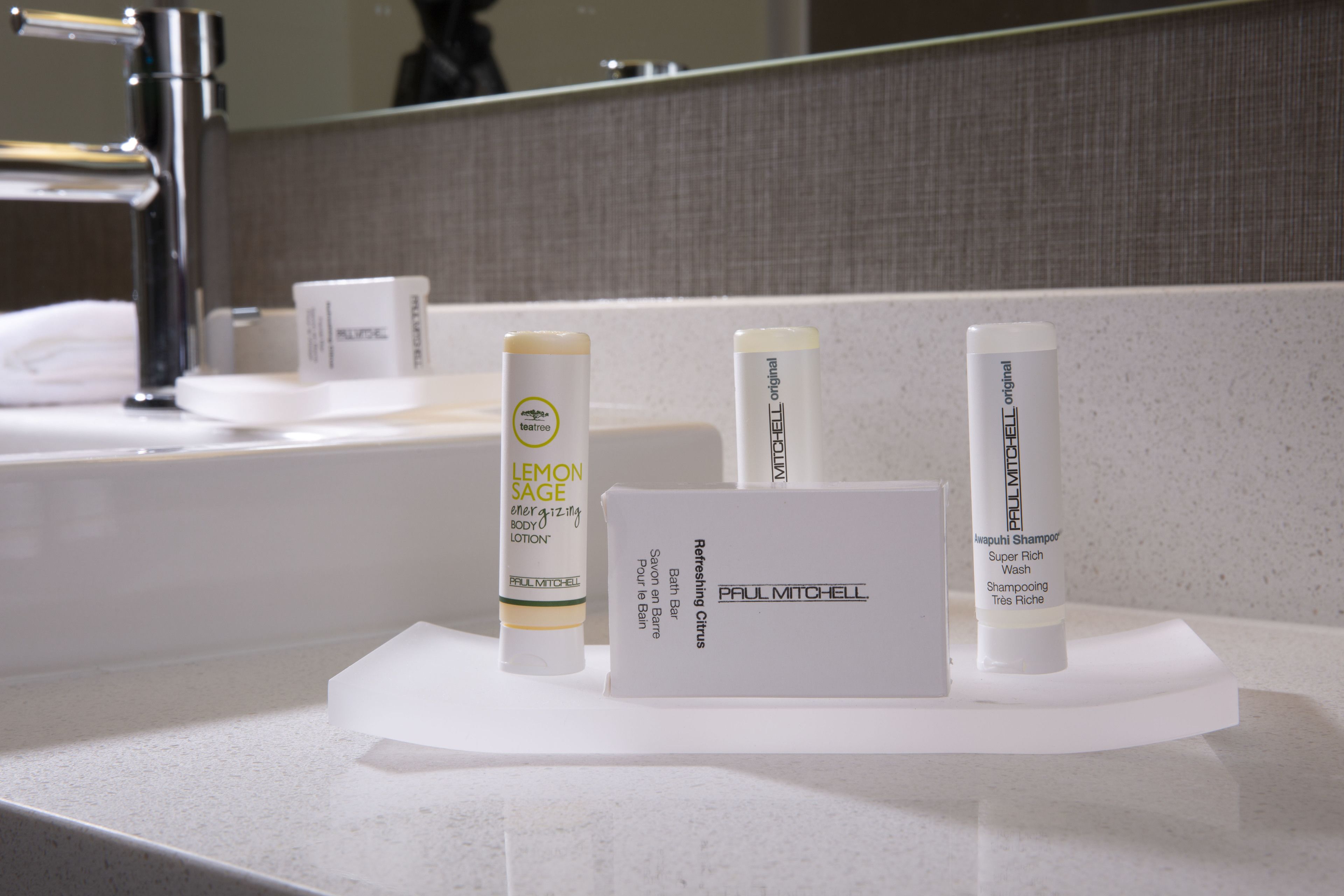 combined shower/bathtub, designer toiletries, hair dryer, towels