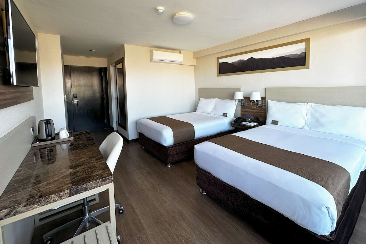 Twin Room, 2 Single Beds | Minibar, in-room safe, desk, free WiFi