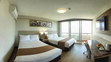 Chambre avec lits jumeaux, 2 lits une place | Minibar, coffres-forts dans les chambres, bureau, Wi-Fi gratuit