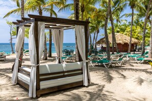 On the beach, sun loungers, beach towels, beach massages