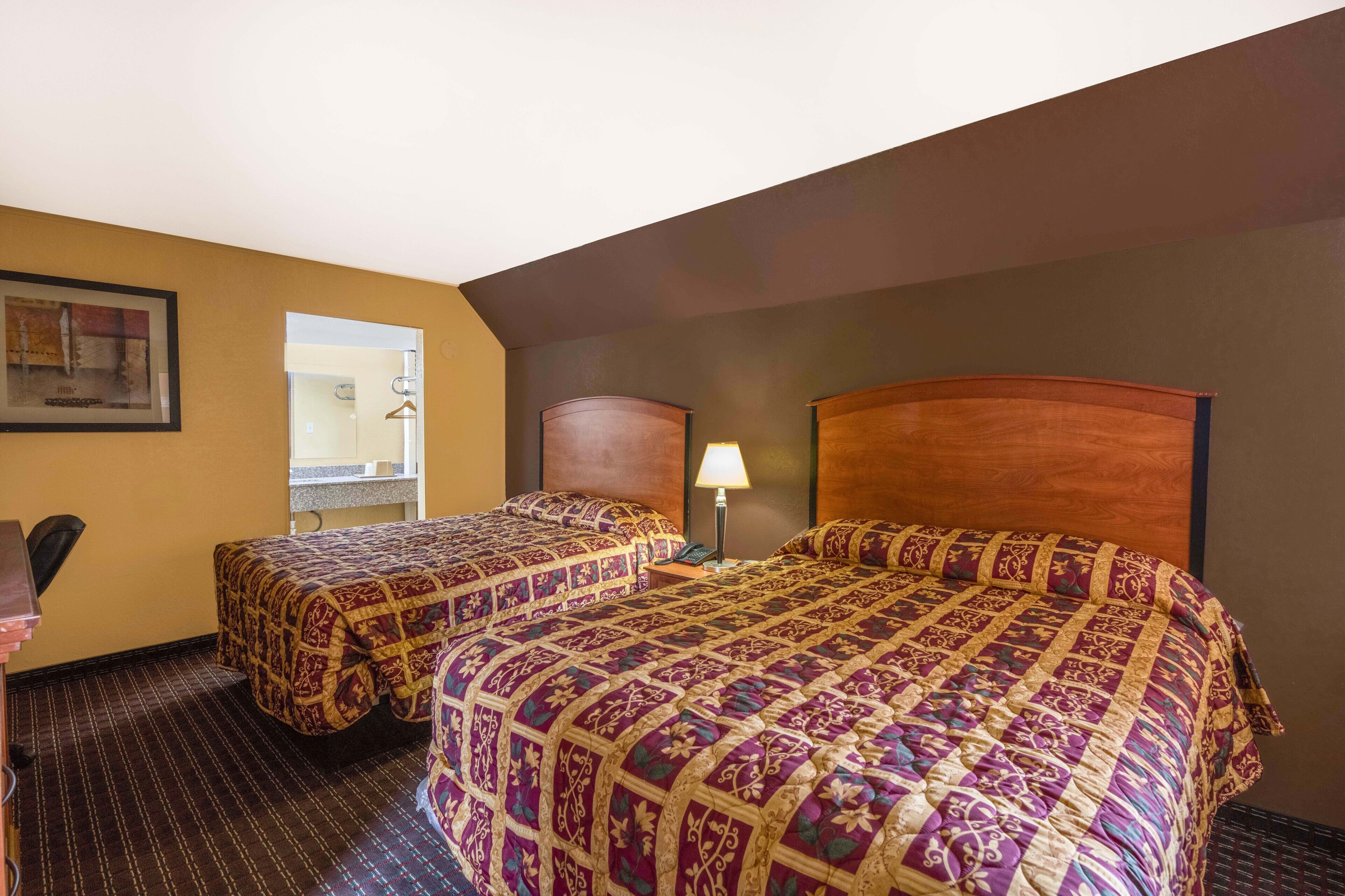 Premium Room, 2 Queen Beds, Kitchenette | Desk, WiFi (free), bed sheets