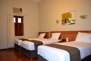 Triple Room, 1 Bedroom | Minibar, in-room safe, desk, free WiFi