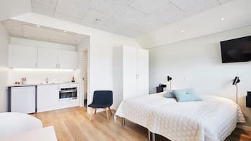 Doppel- oder Zweibettzimmer, 1 Schlafzimmer, Terrasse, Erdgeschoss | 1 Schlafzimmer, schallisolierte Zimmer, Bügeleisen/Bügelbrett