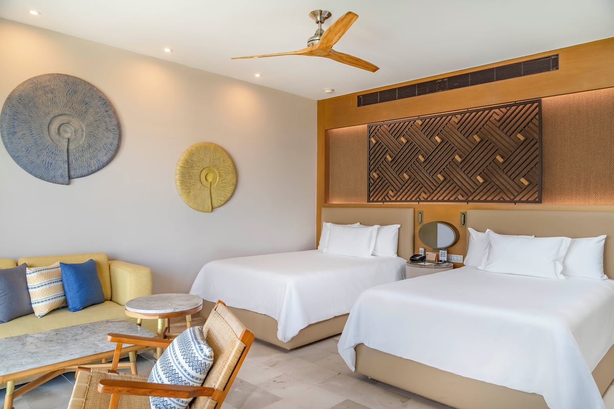Junior Suite, 2 Double Beds, Partial Ocean View | Premium bedding, pillowtop beds, minibar (free items), in-room safe