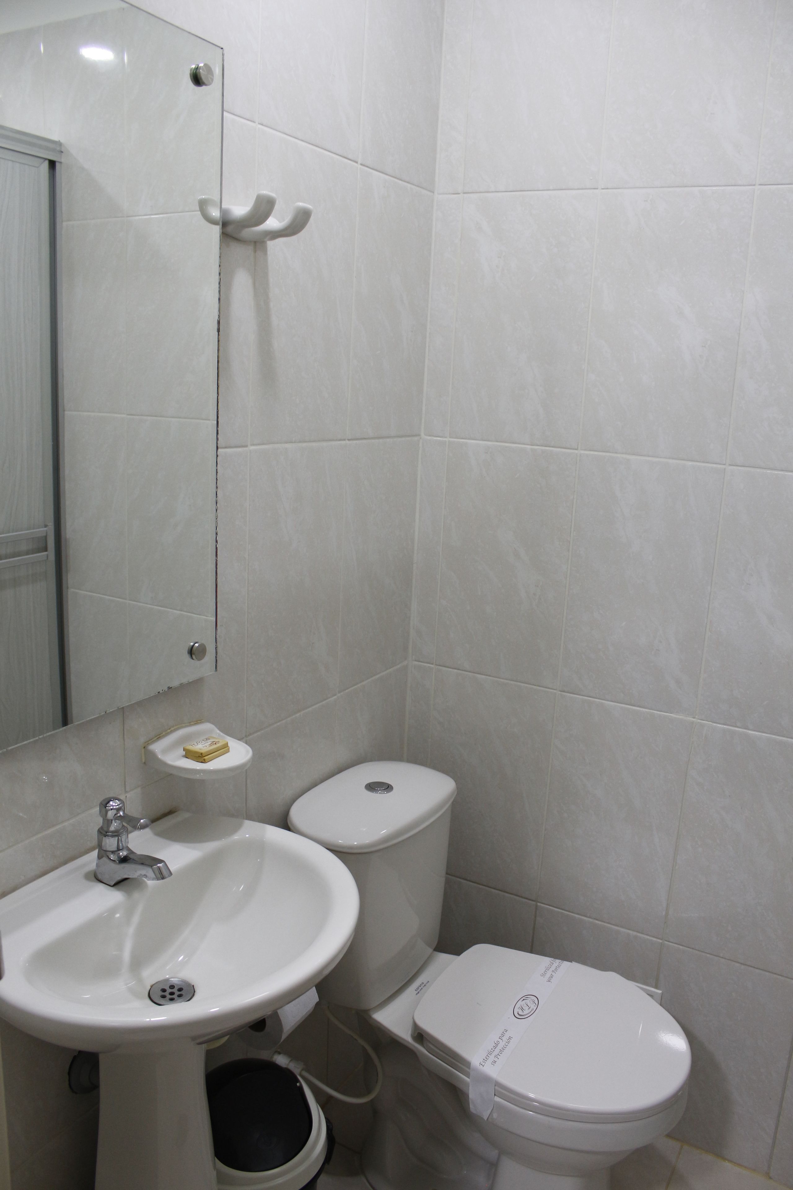 shower, rainfall showerhead, hair dryer, towels