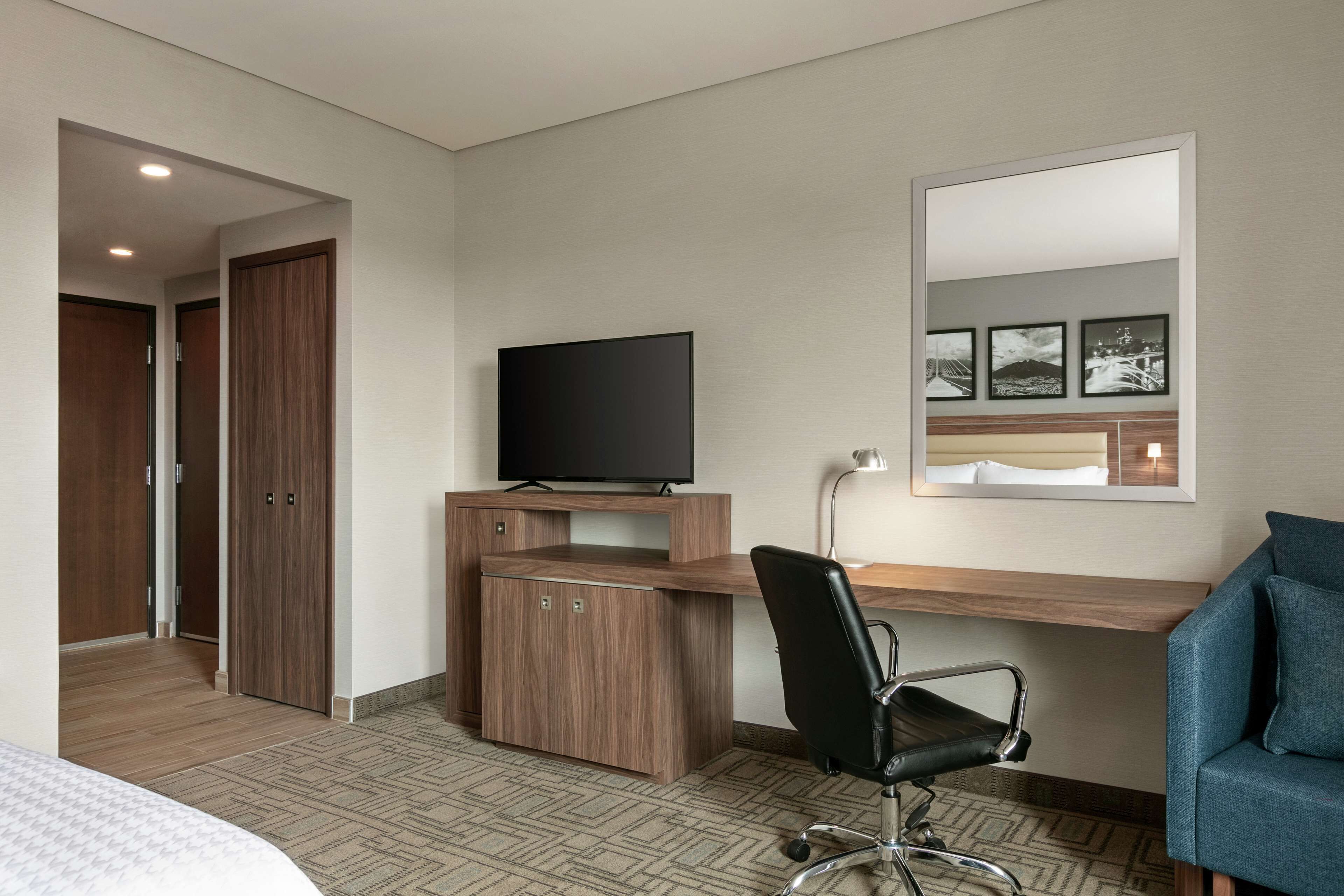 room, 1 king bed, accessible (mobility & hearing, roll-in shower) | in-room safe, desk, iron/ironing board, free wifi