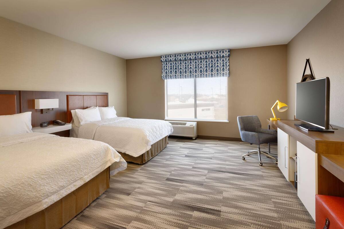 In-room safe, desk, laptop workspace, cribs (free)