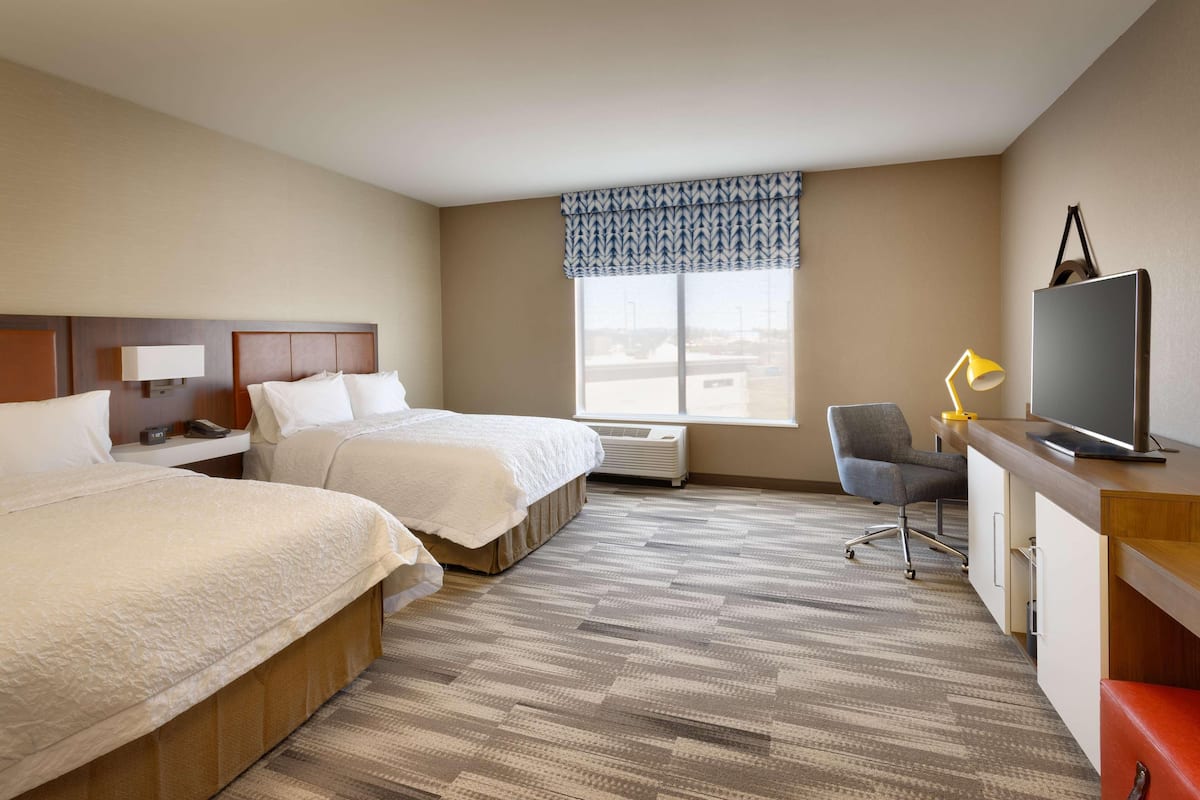 In-room safe, desk, laptop workspace, cribs (free)