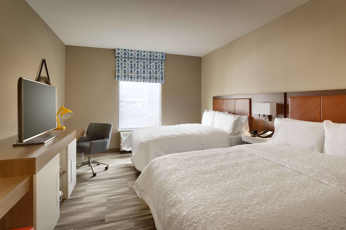 In-room safe, desk, laptop workspace, cribs (free)