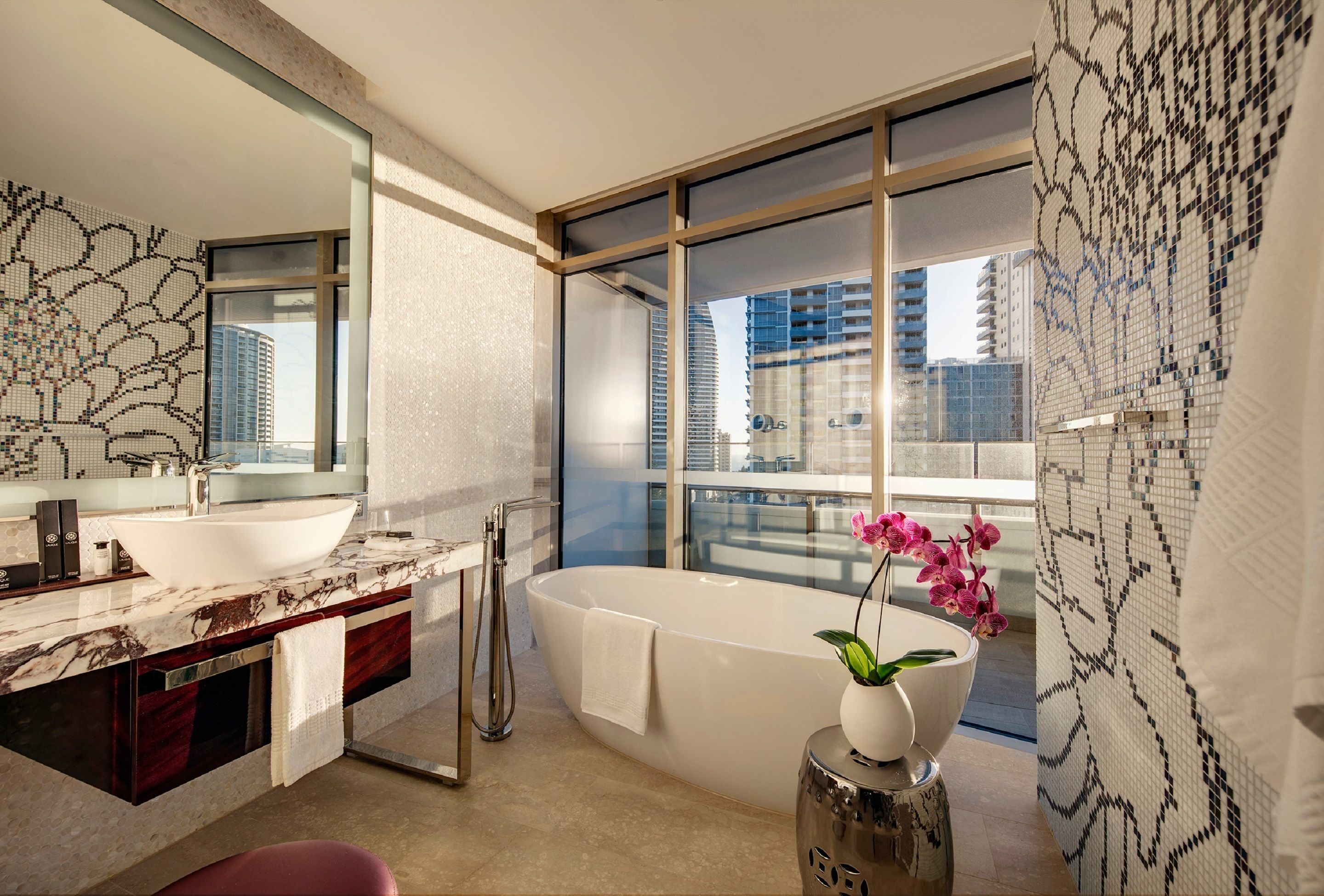 separate bathtub and shower, deep-soaking bathtub, designer toiletries