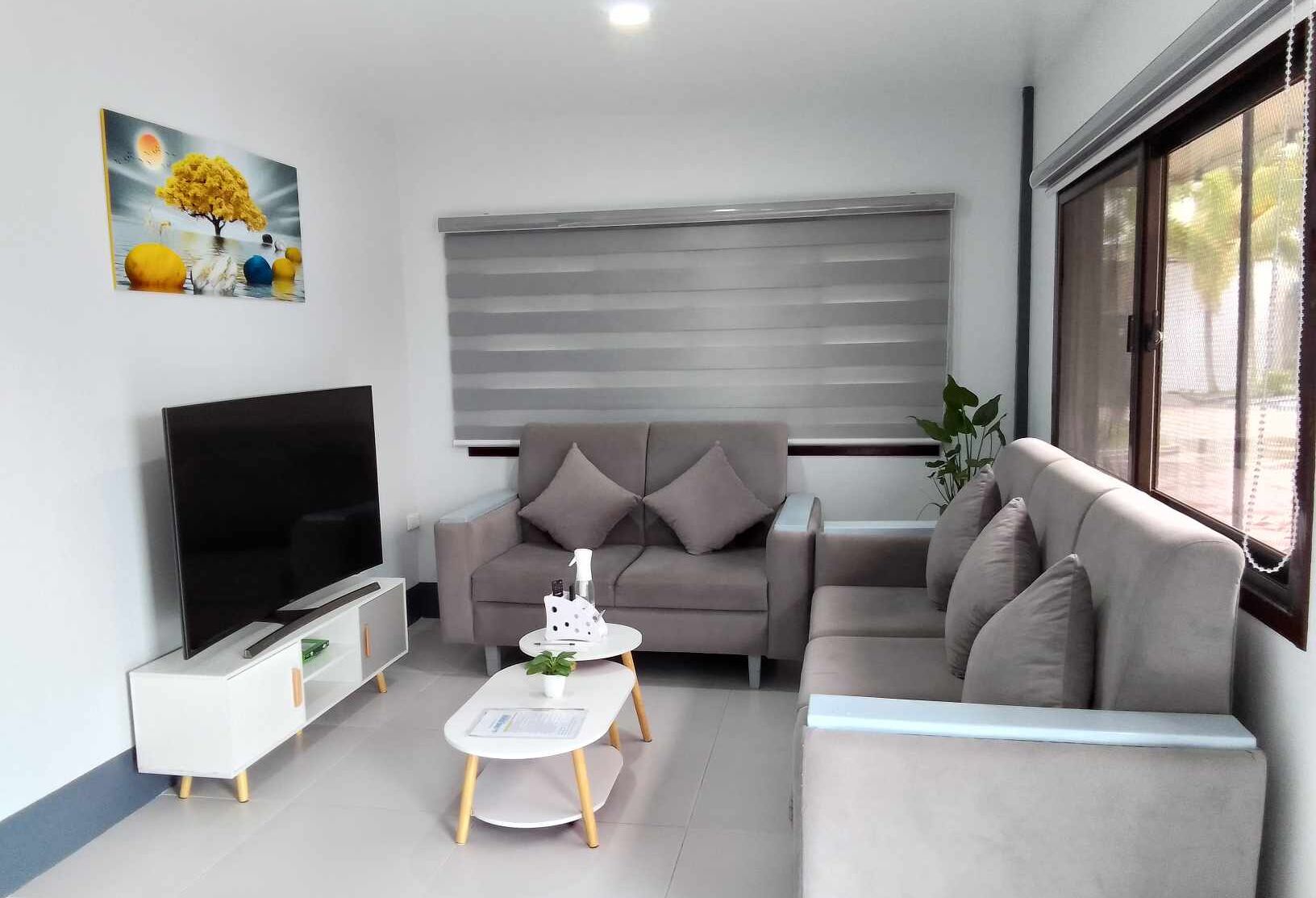 Småhus – deluxe | Safe på rommet, individuelt innredet og skrivebord