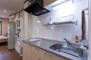 Apartment | Private kitchen - Kariyushi Condominium Resort Ginowan CASa N.Y (Ginowan)