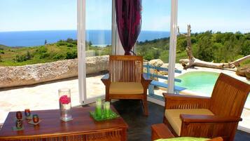 Family Villa, 2 Bedrooms, Ocean View, Sea Facing | Living room | Flat-screen TV, fireplace