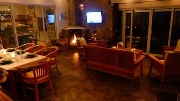 Family Villa, 2 Bedrooms, Ocean View, Sea Facing | Living area | Flat-screen TV, fireplace