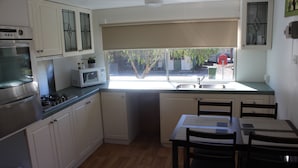 Comfort Cabin, 2 Bedrooms, Park View | Private kitchen - Wonky Stables Holiday Park (Forrest)