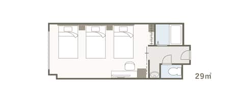 A floor plan of a hotel room with a bed, a desk, a bathroom, and a small sitting area.