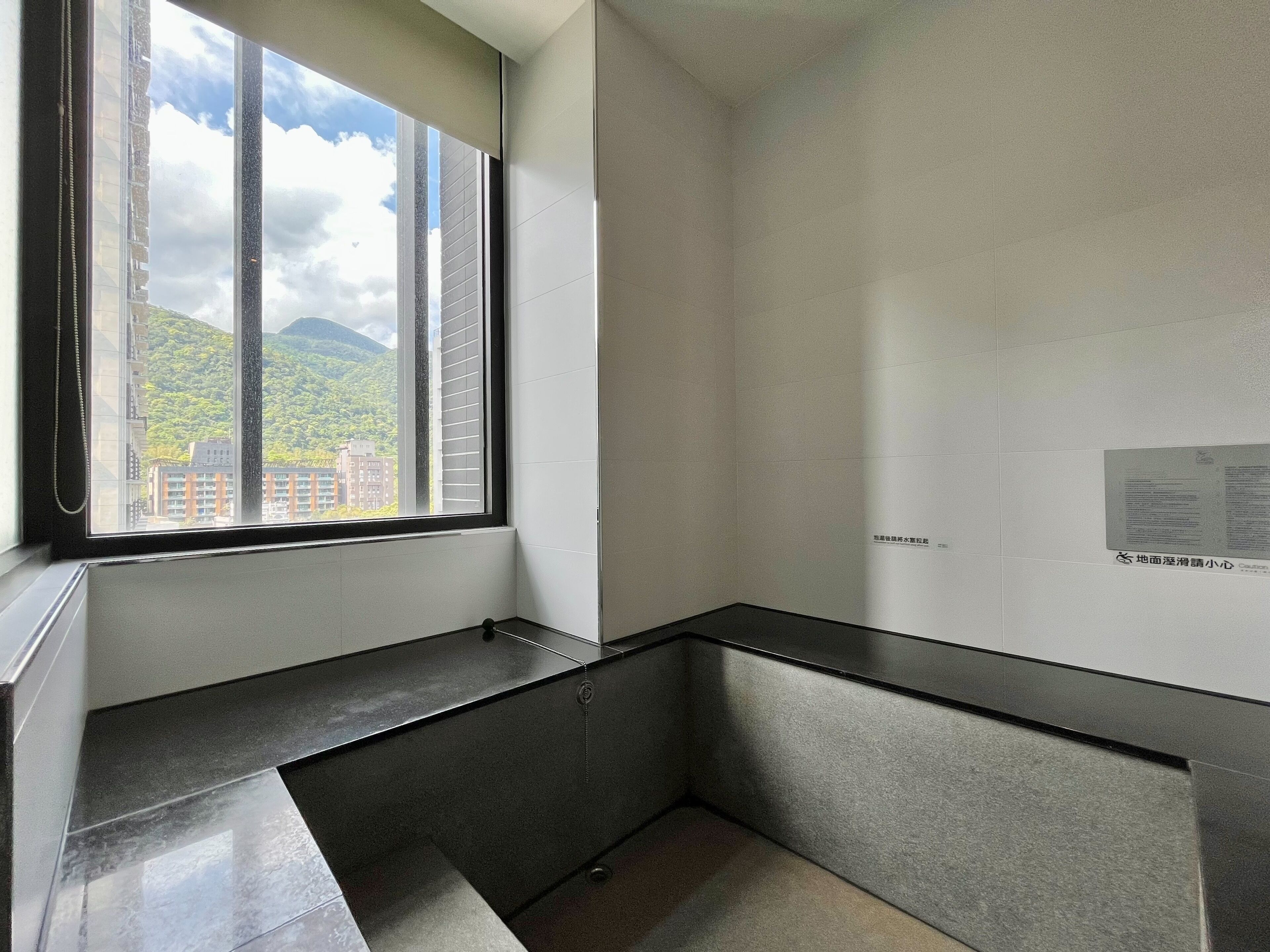 standard double room | bathroom | separate bathtub and shower, spring water bathtub, hair dryer, slippers