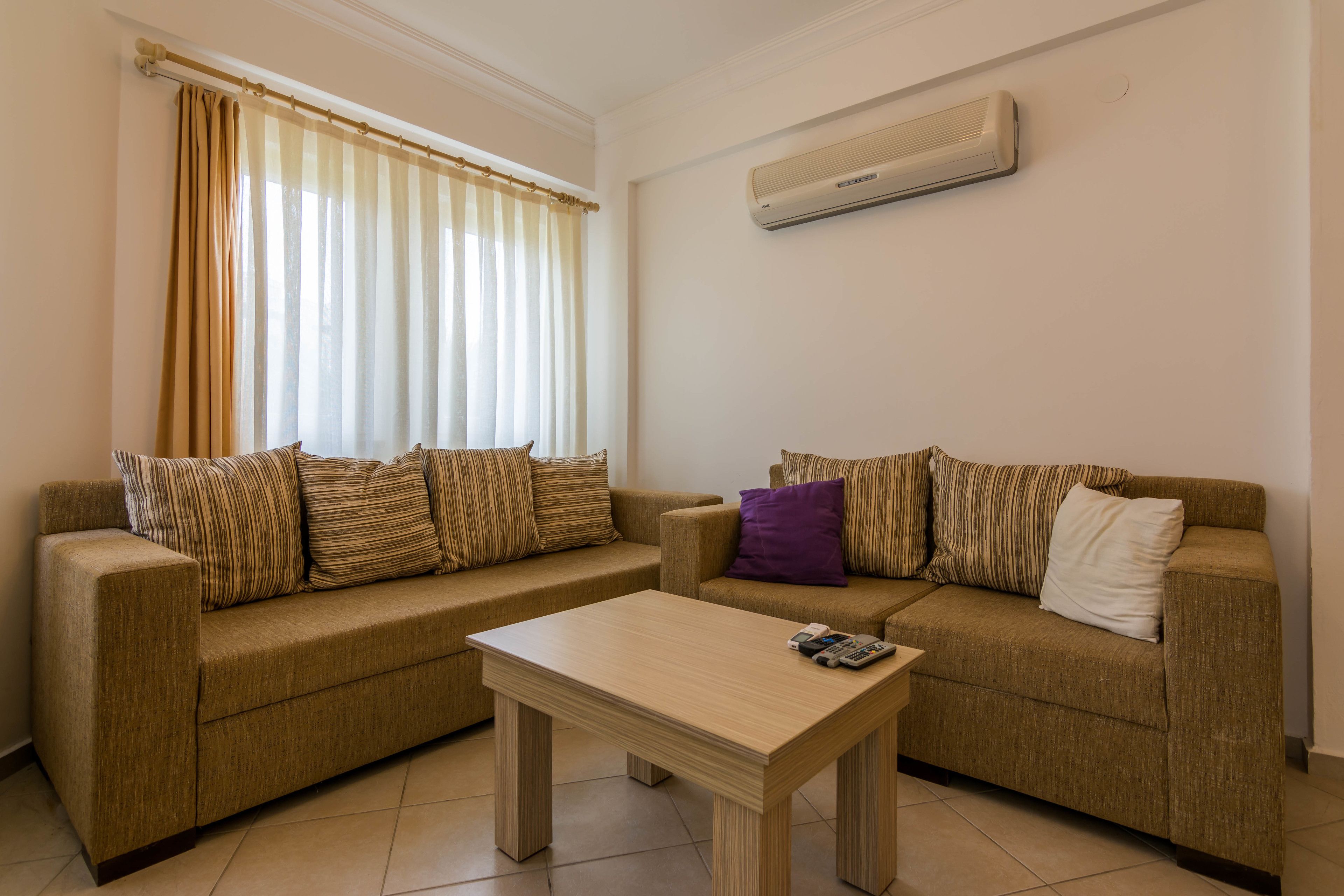 deluxe villa, 3 bedrooms | living area | lcd tv