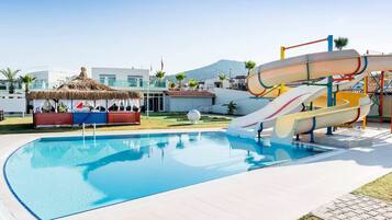 7 outdoor pools, open 9:00 AM to 7:00 PM, pool umbrellas, sun loungers