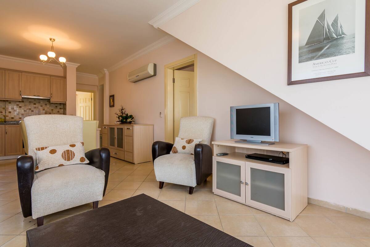 deluxe apartment, 2 bedrooms | living room | lcd tv