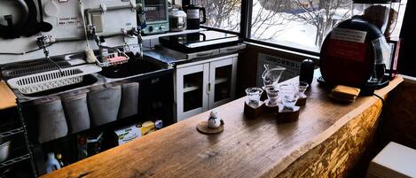Fridge, microwave, stovetop, coffee/tea maker