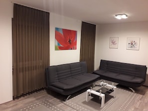 Televisión de pantalla plana, películas con cargo