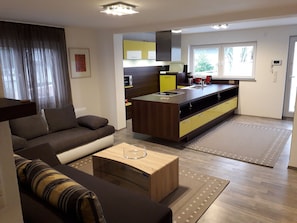 Televisión de pantalla plana, películas con cargo