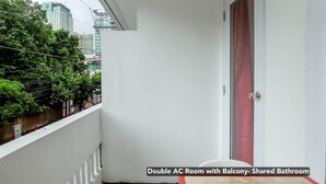 A double AC room with a balcony and a shared bathroom. - Stay Malate Hostel (Manila)
