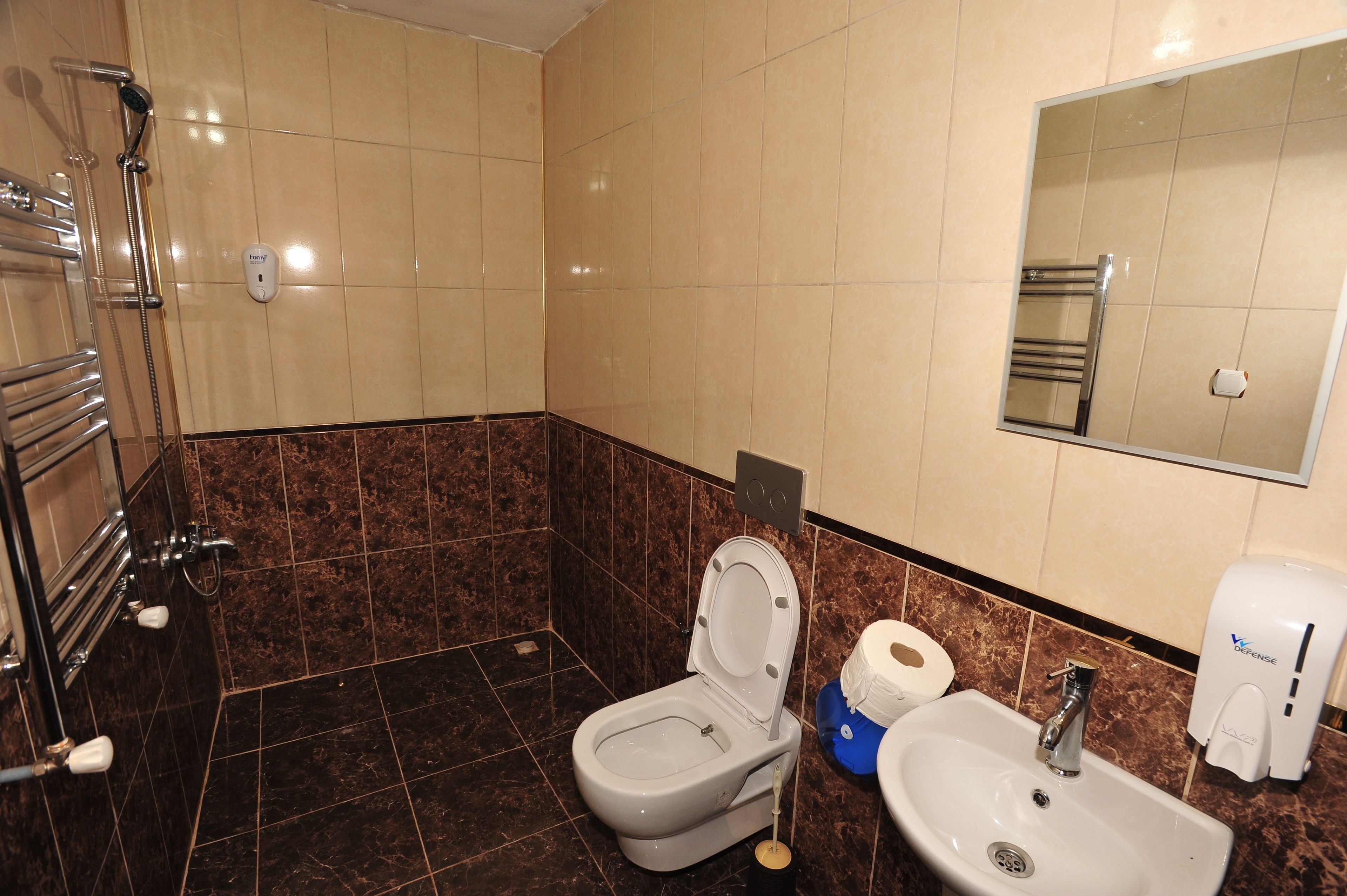 standard quadruple room | bathroom | shower, free toiletries, hair dryer, slippers