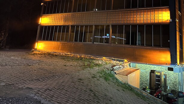 A building with a sign reading "CAM OTEL" and a paved entrance area. - Çam Otel 2 (Çaykara)