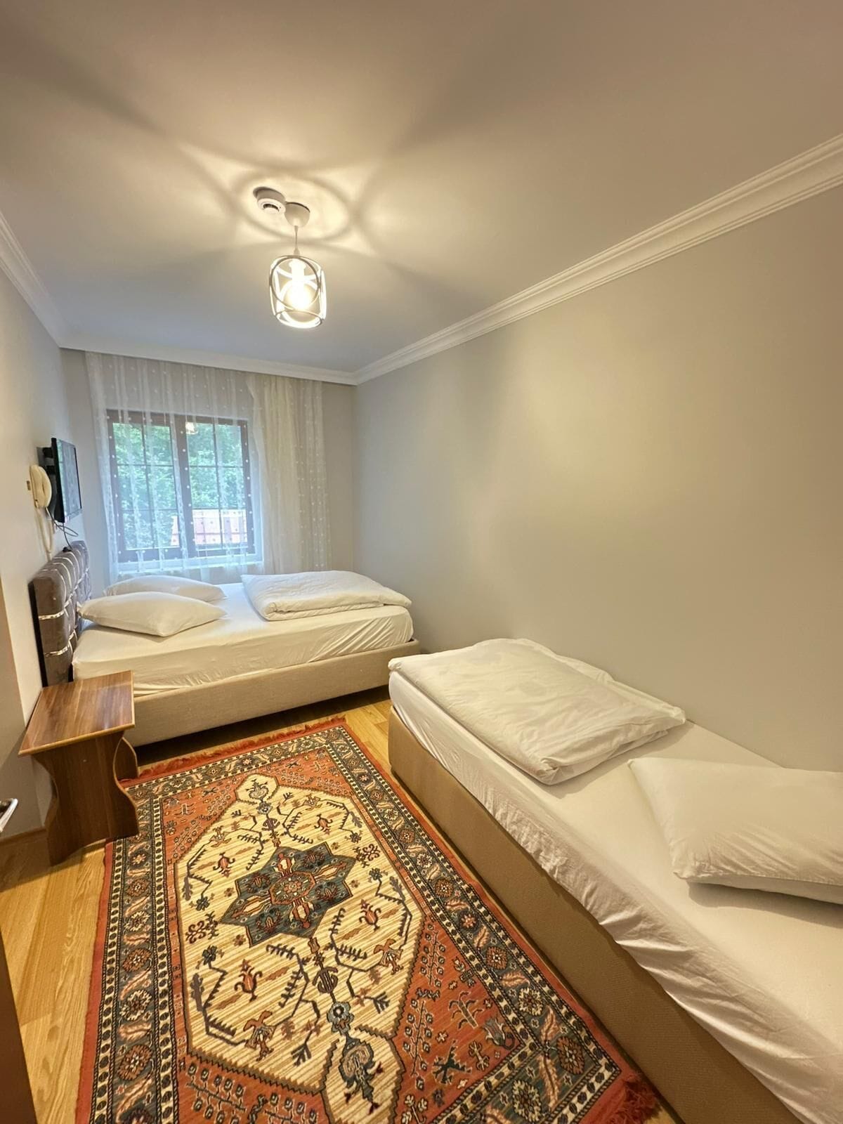 Suite, 2 Bedrooms | Desk, soundproofing, free rollaway beds, free WiFi