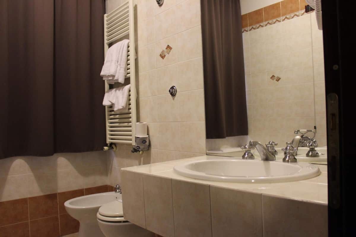 rainfall showerhead, free toiletries, bathrobes, slippers