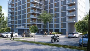 A modern multi-story residential building with balconies, a paved ground floor, and a clear sky. - Chopin Apartments Union (Warsaw)