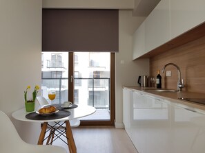 Studio | Private kitchenette | Full-sized fridge, microwave, stovetop, dishwasher