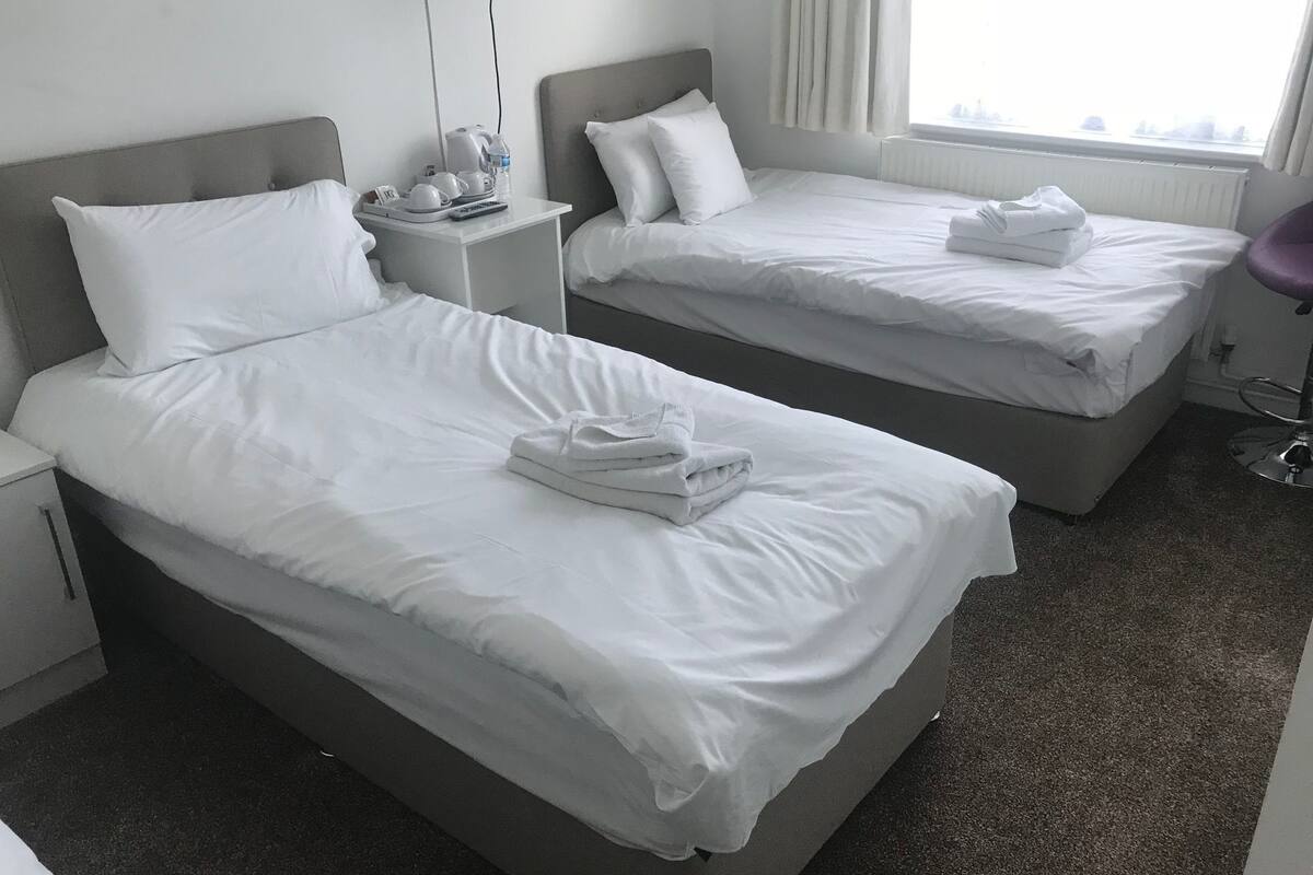 family room (6) | premium bedding, desk, laptop workspace, iron/ironing board