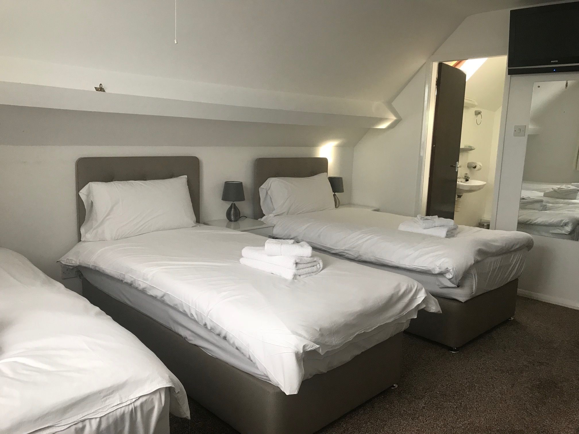 family room (12) | premium bedding, desk, laptop workspace, iron/ironing board